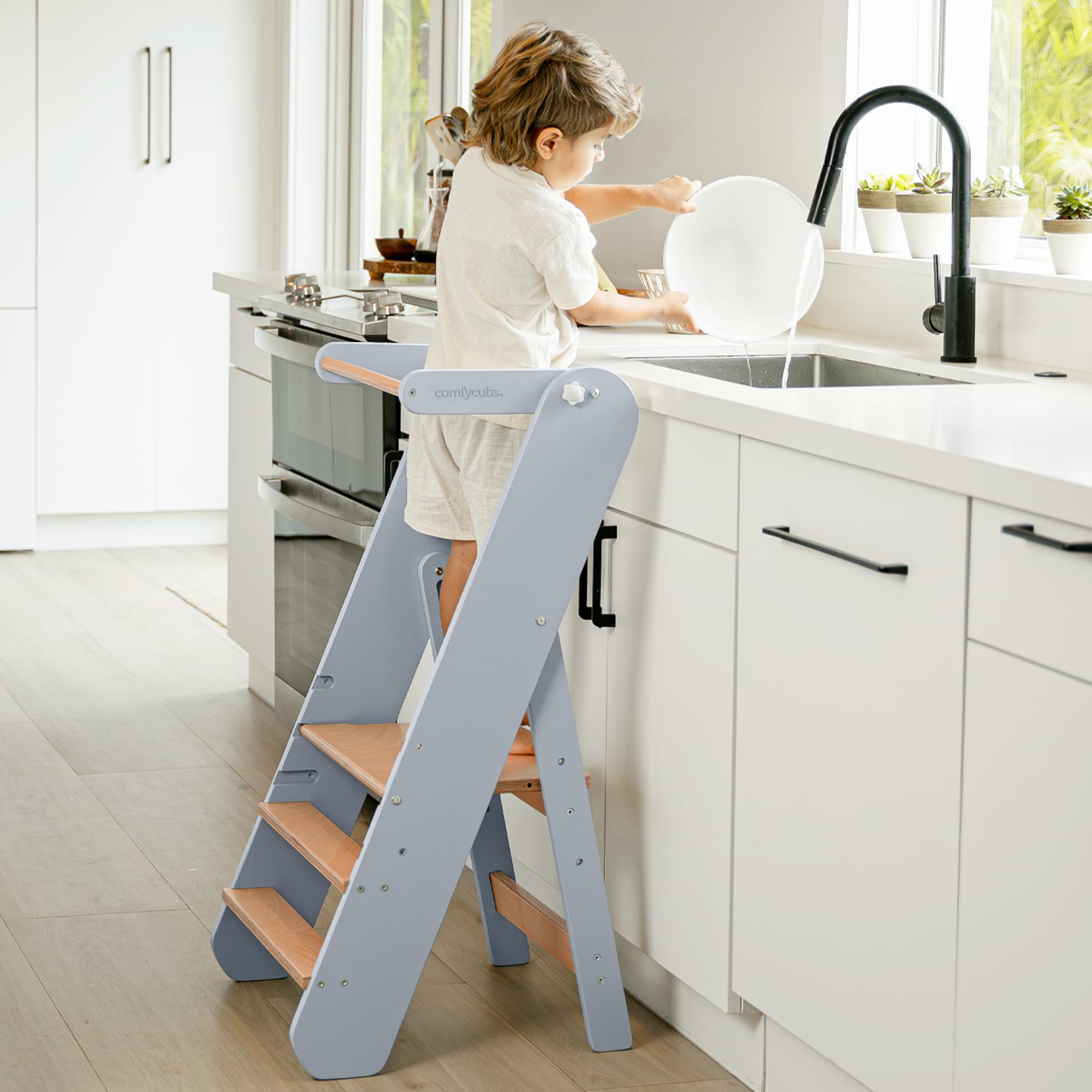 Comfy Cubs Pacific Blue step stool assembled for stable toddler reach at sinks.