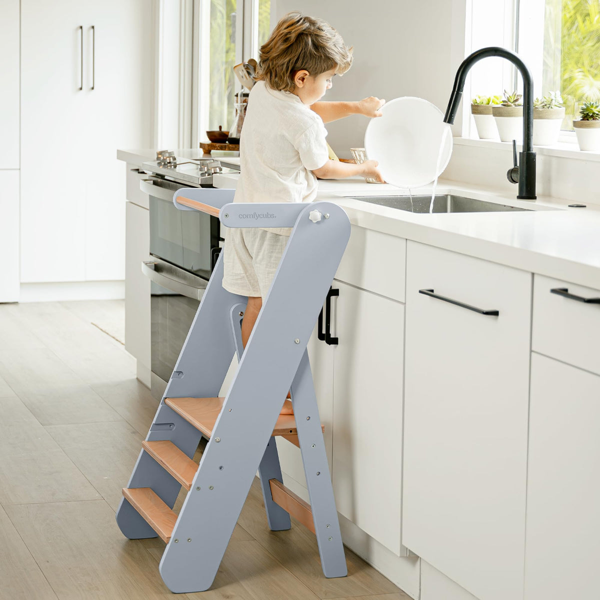 Comfy Cubs Pacific Blue step stool assembled for stable toddler reach at sinks.