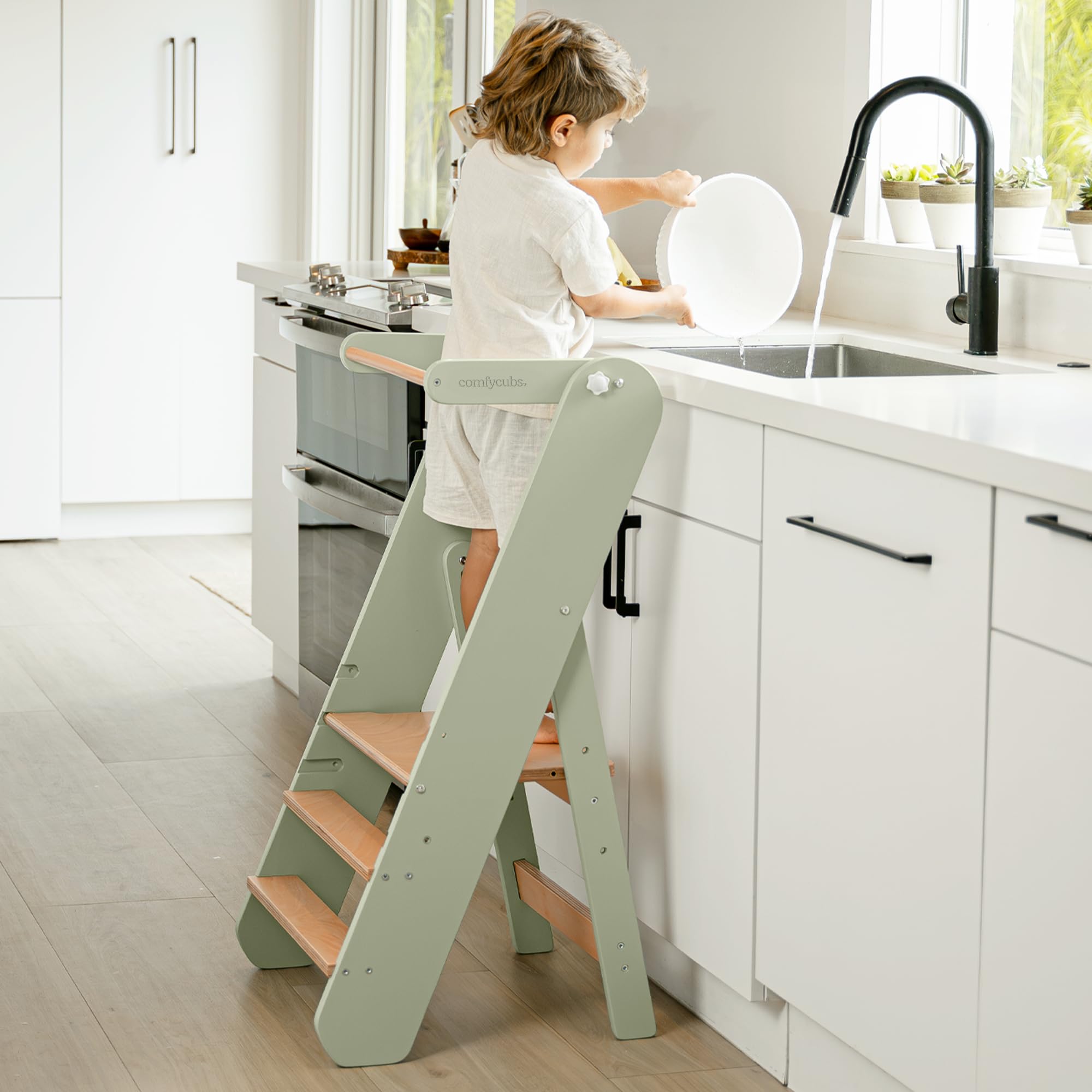 Comfy Cubs step stool shows three height levels for growing kids reaching sinks.