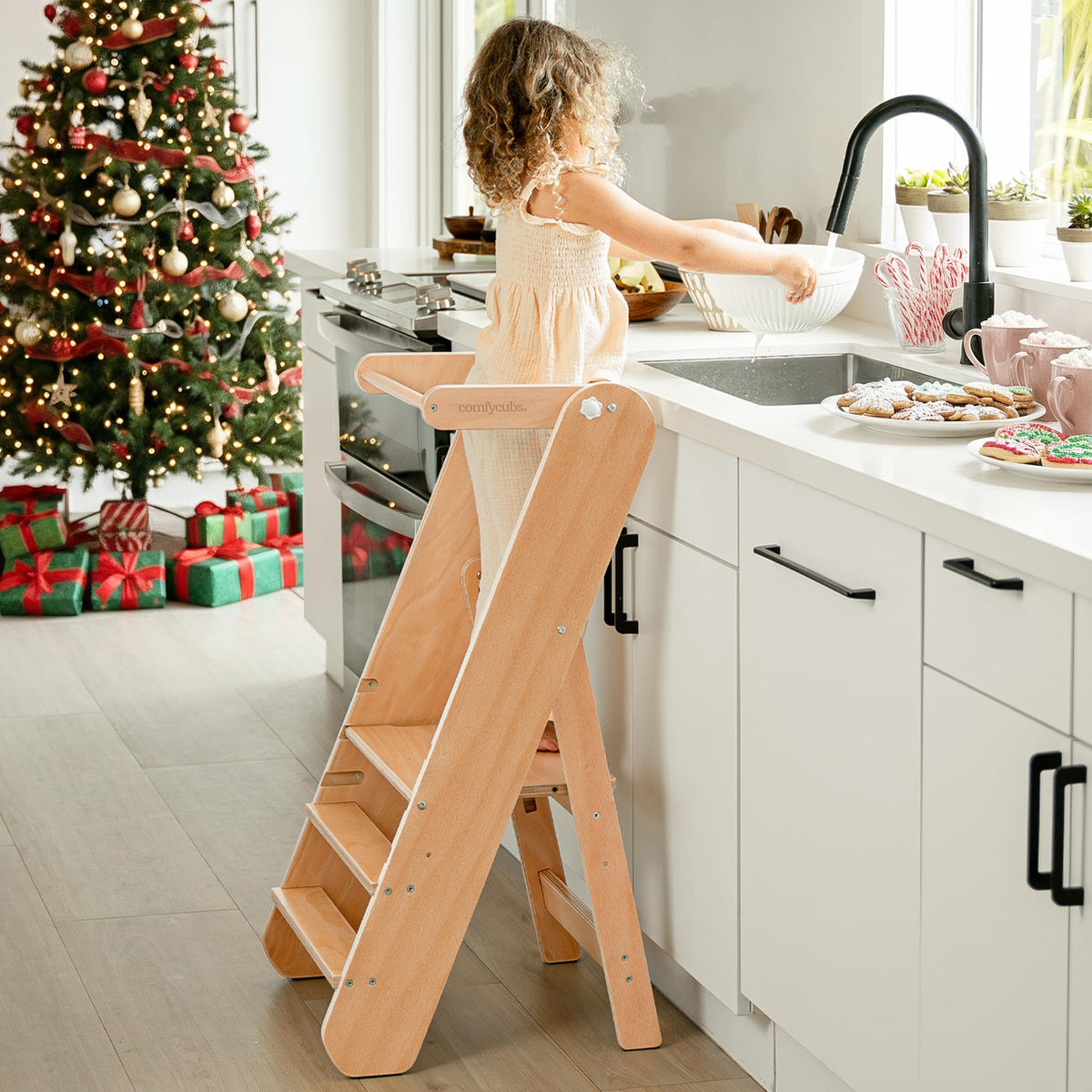 Comfy Cubs kids step stool provides three height levels for growing independence at sinks and counters.