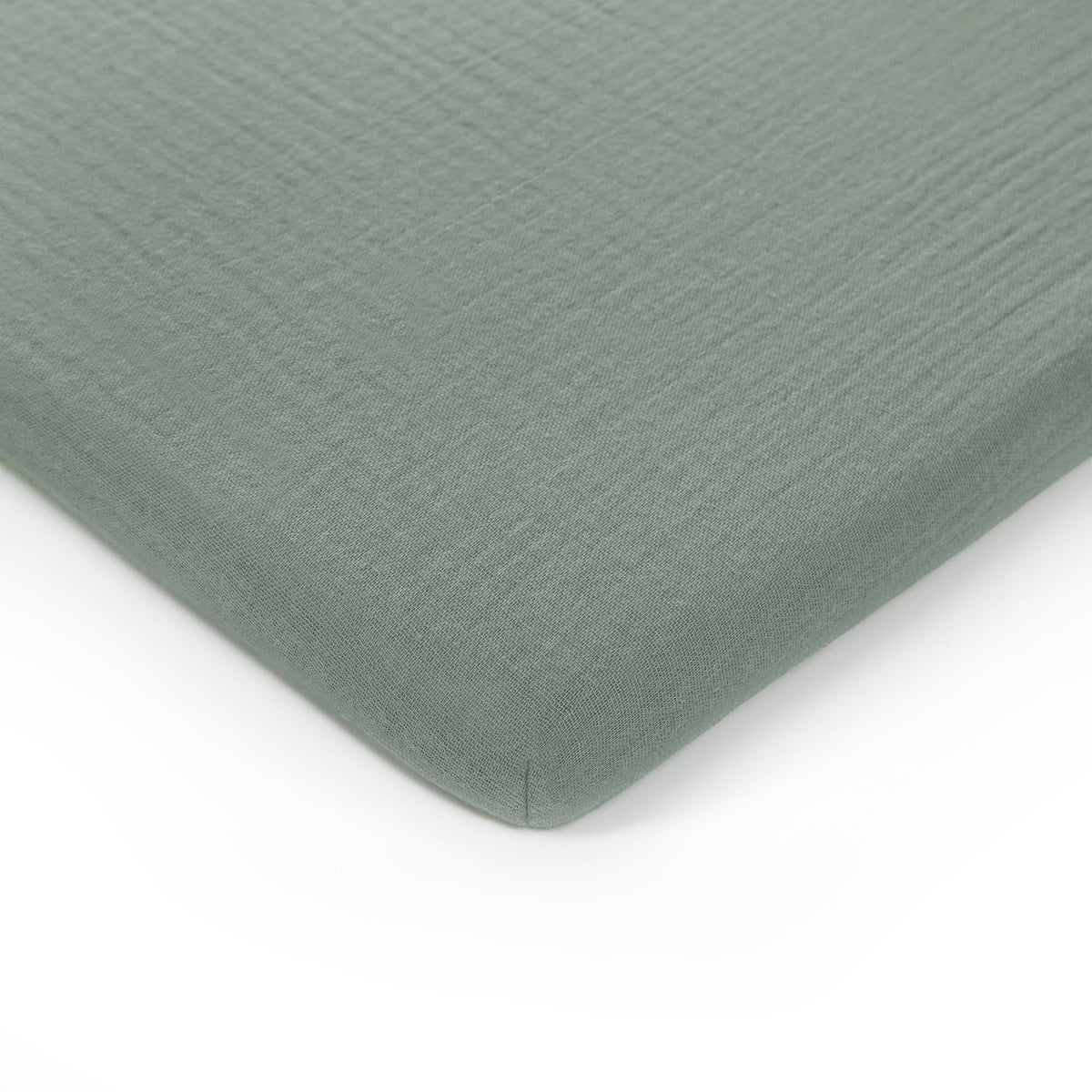 Comfy Cubs Muslin Bassinet Sheet closeup fabric highlights breathable cotton for cooler sleep