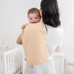 Comfy Cubs 6-layer burp cloth close-up shows thick absorbent muslin construction.