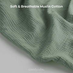 Comfy Cubs Muslin Nursing Cover Fern soft fabric closeup highlights gentle touch.