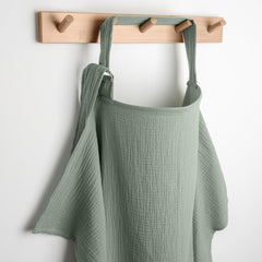 Comfy Cubs Muslin Nursing Cover Fern unfolded, breathable fabric for comfortable feeding.