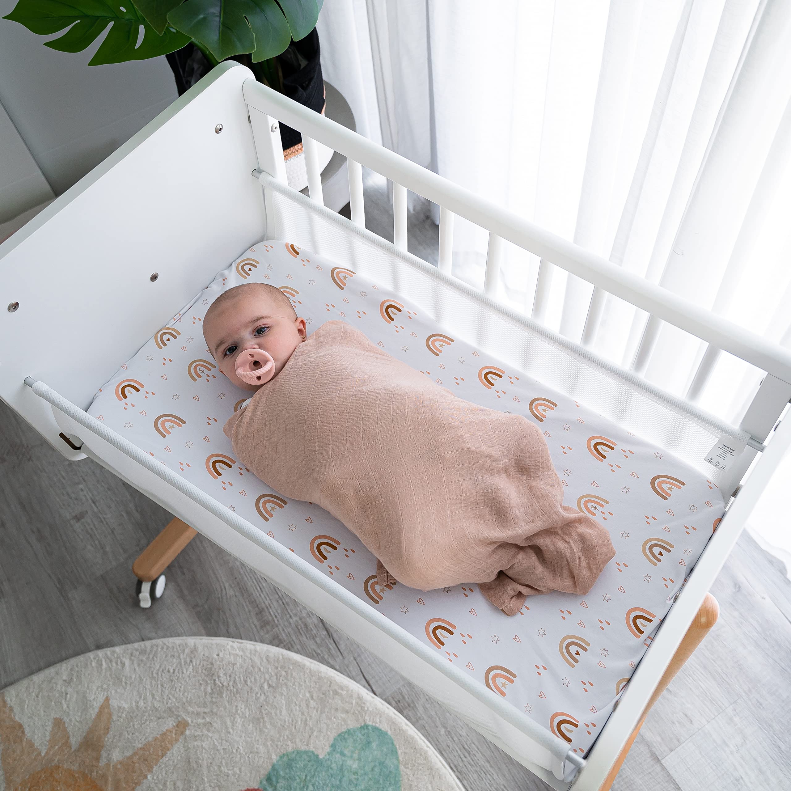 Comfy Cubs muslin swaddle blanket 47x47 full coverage for secure swaddling and shade.