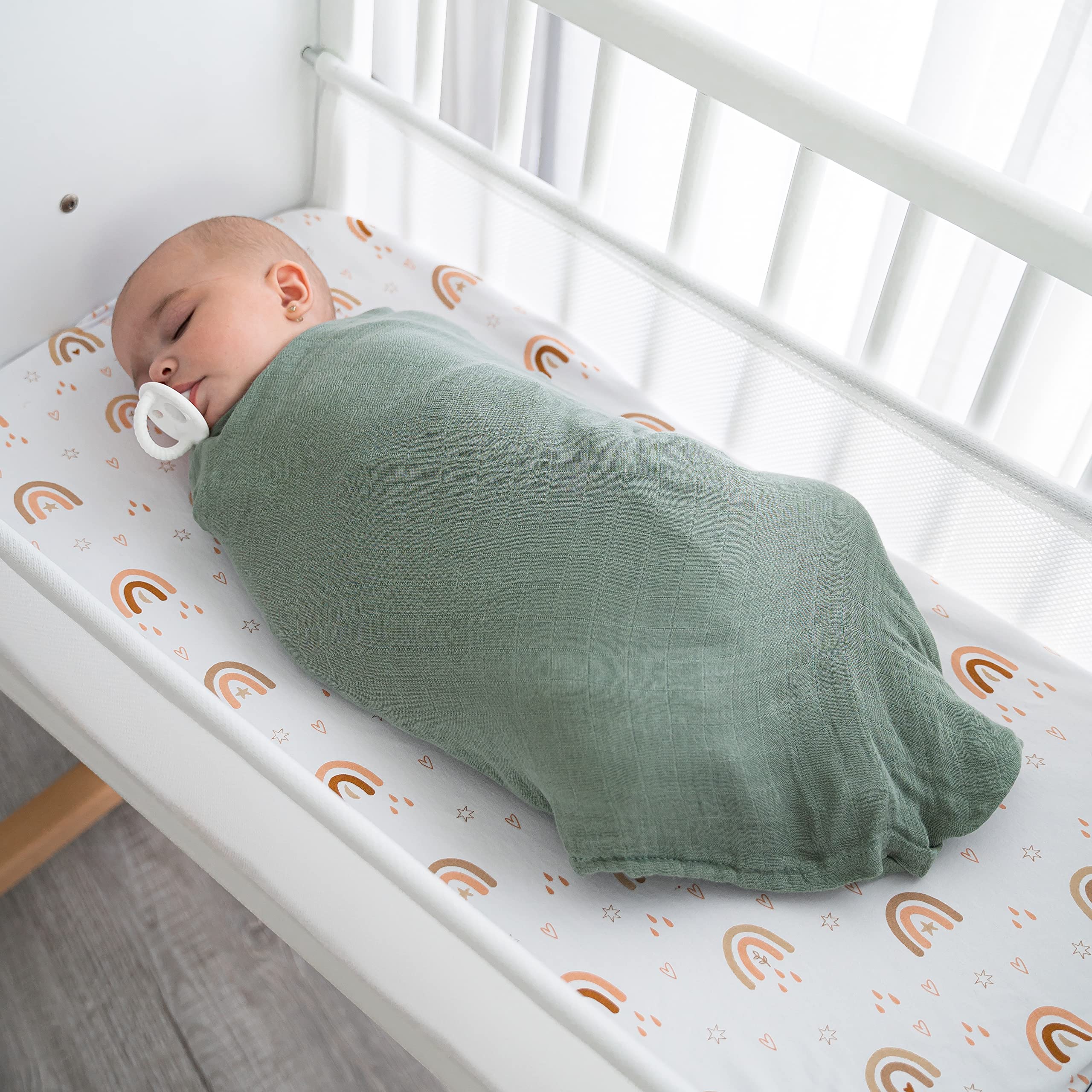 Comfy Cubs muslin swaddle blankets 47x47 laid flat for full coverage and secure swaddling.