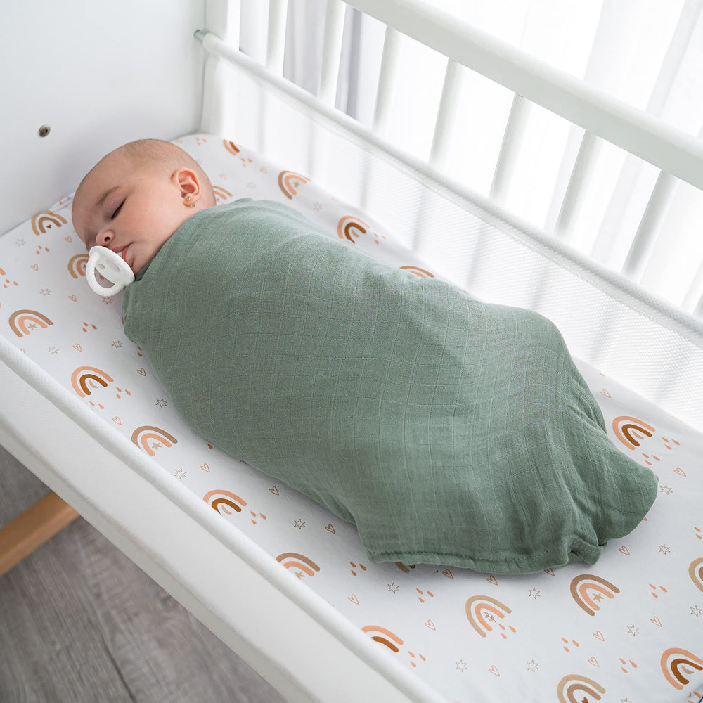 Comfy Cubs muslin swaddle blankets 47x47 laid flat for full coverage and secure swaddling.