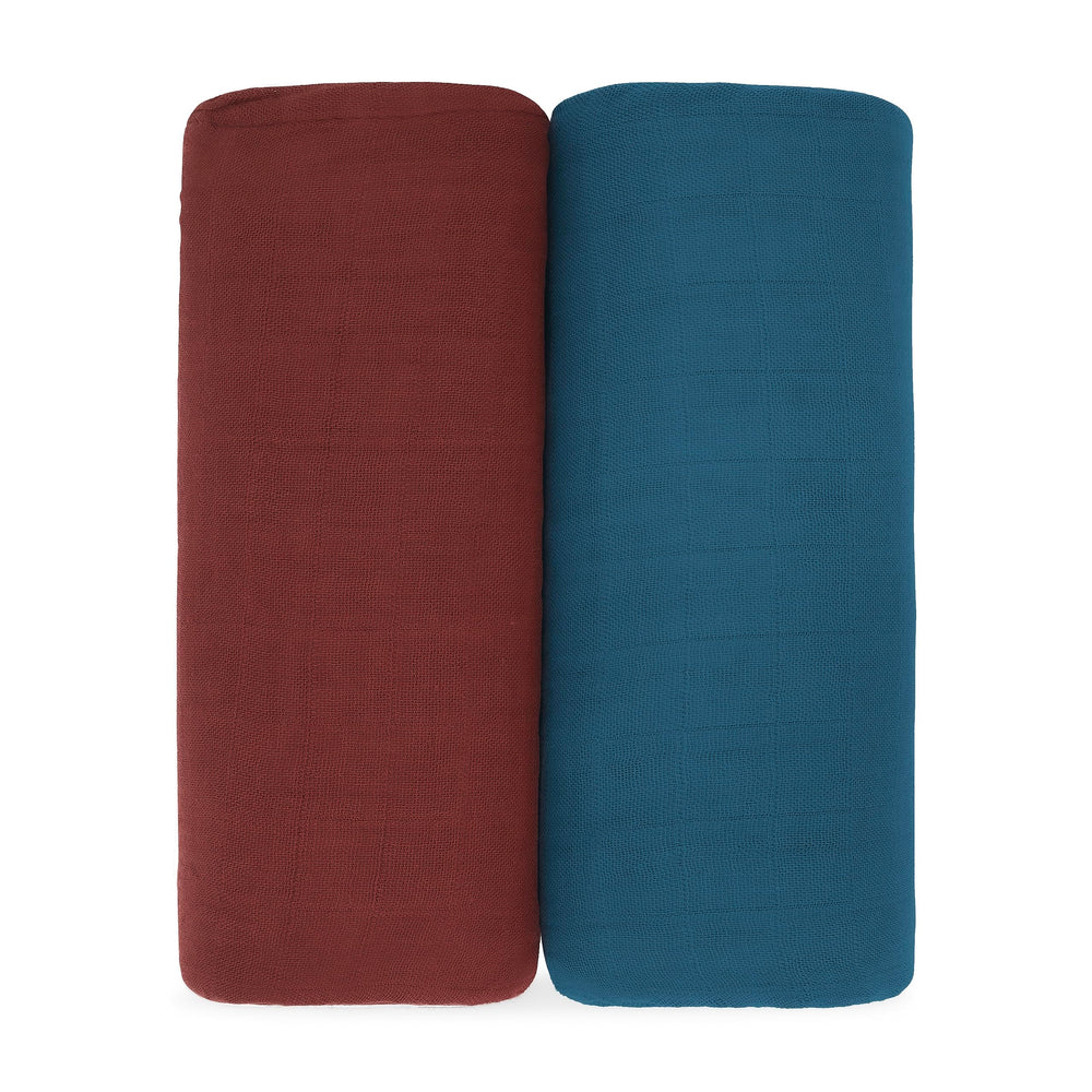 Comfy Cubs muslin swaddle in wine, close-up of soft fabric for all-season comfort.