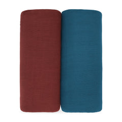 Comfy Cubs muslin swaddle in wine, close-up of soft fabric for all-season comfort.