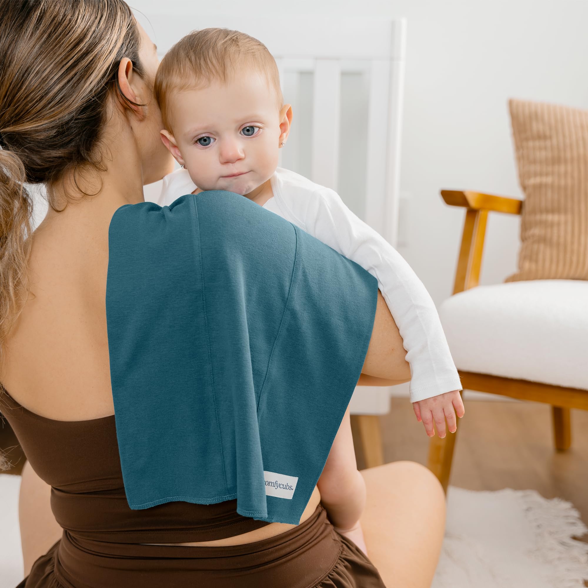 Comfy Cubs Neptune burp cloths in-use against baby during feeding