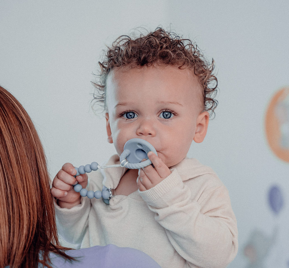 Comfy Cubs pacifier blue soft-nipple detail emphasizes natural-feel comfort