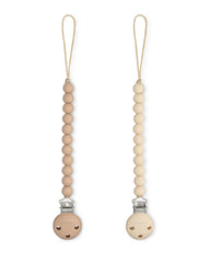 Comfy Cubs pacifier clip beige close-up showing secure silicone grip for on-the-go safety