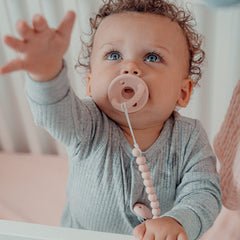 Comfy Cubs pacifier nipple close-up shows soft silicone for comfortable soothing.