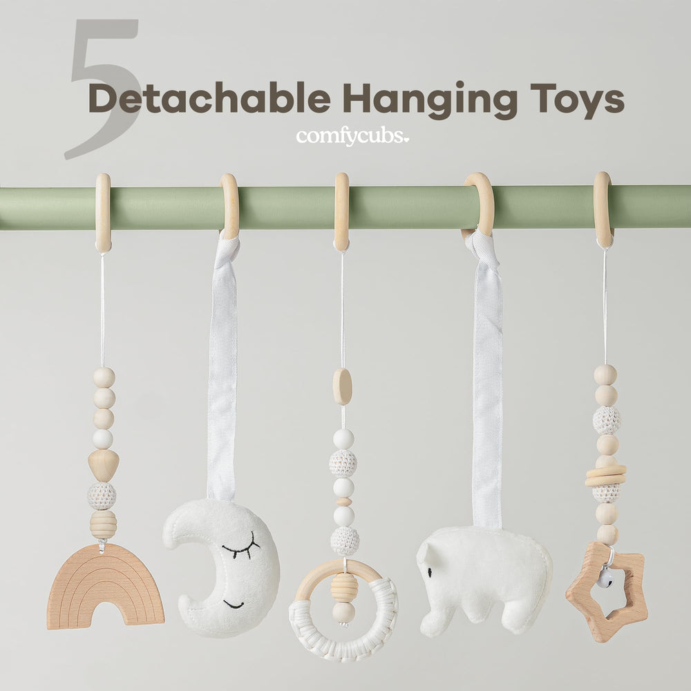 Comfy Cubs play gym five toys closeup showcases sensory hanging toys.