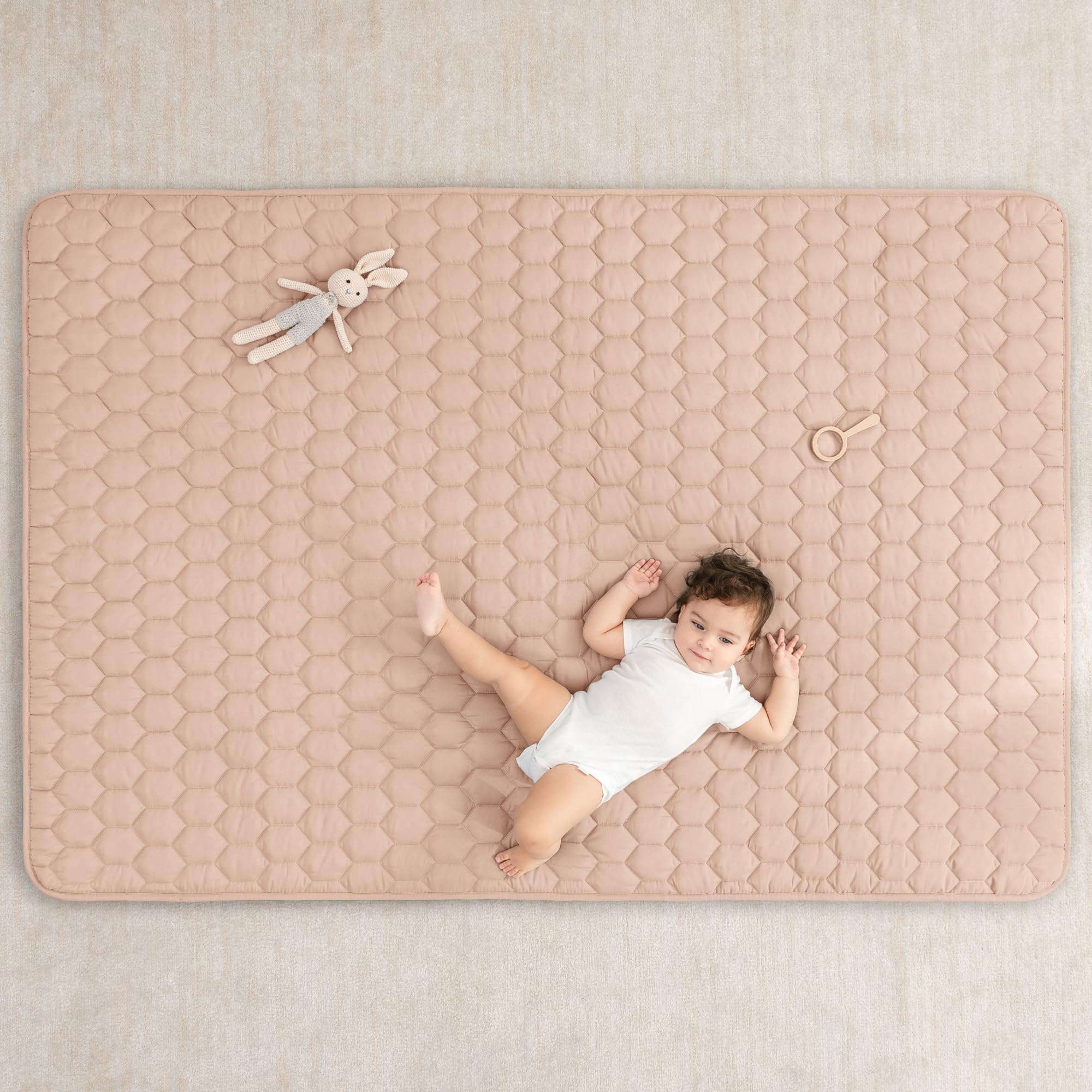 Comfy Cubs rectangle play mat blush kids playing on a cushioned surface