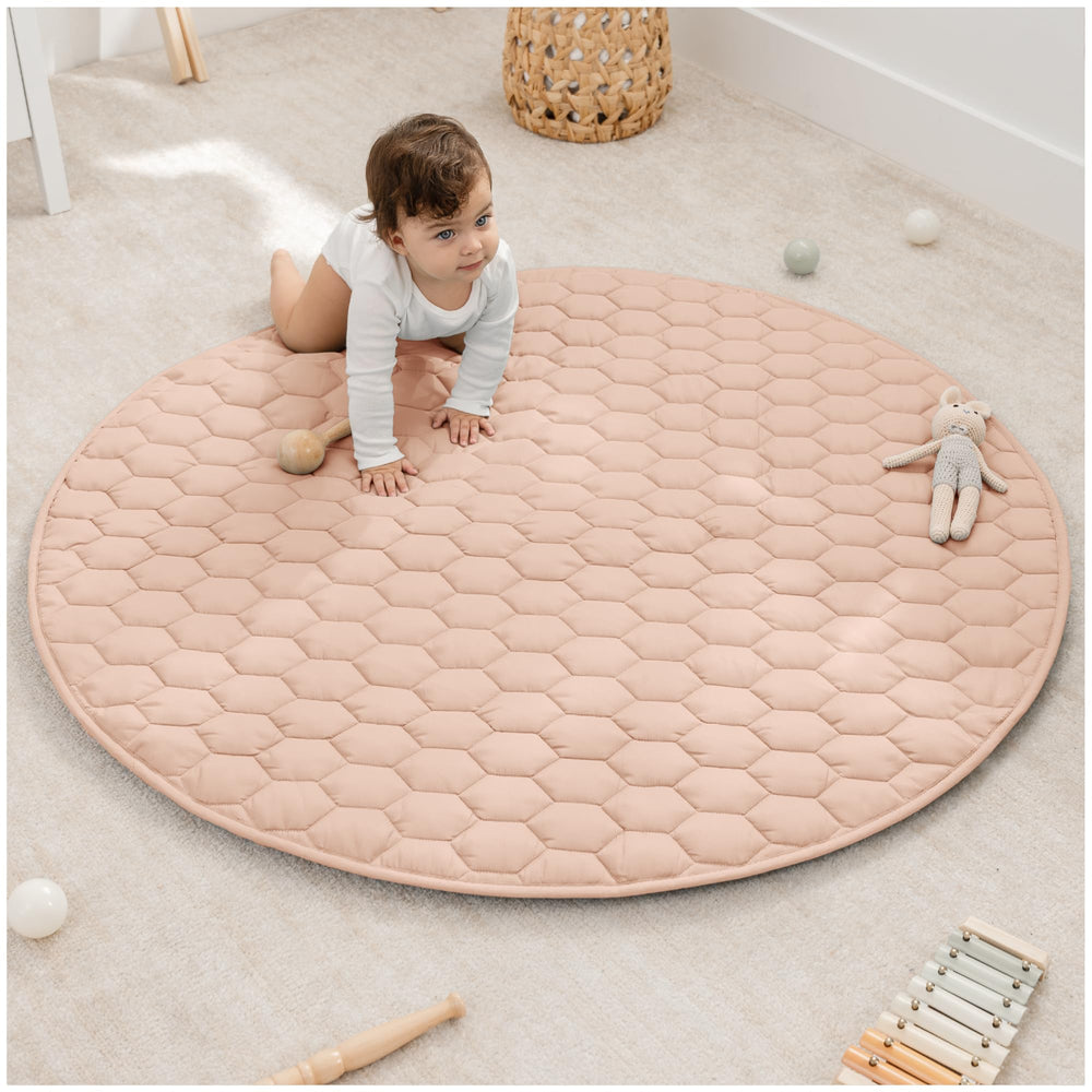 Comfy Cubs round play mat shows plush surface for cozy toddler playtime