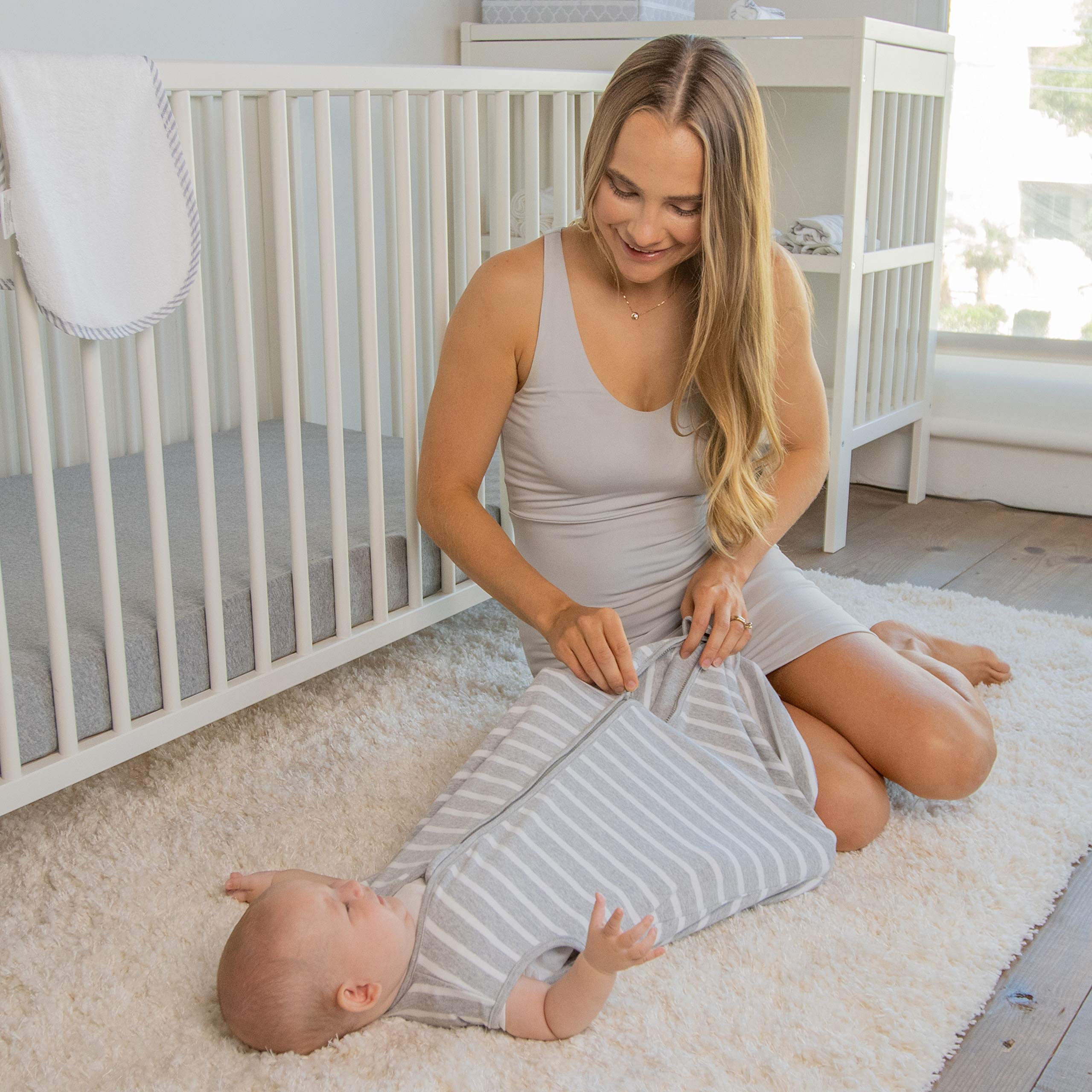 Comfy Cubs sleep sack gray knit cotton close-up, ultra-soft fabric for gentle baby comfort.