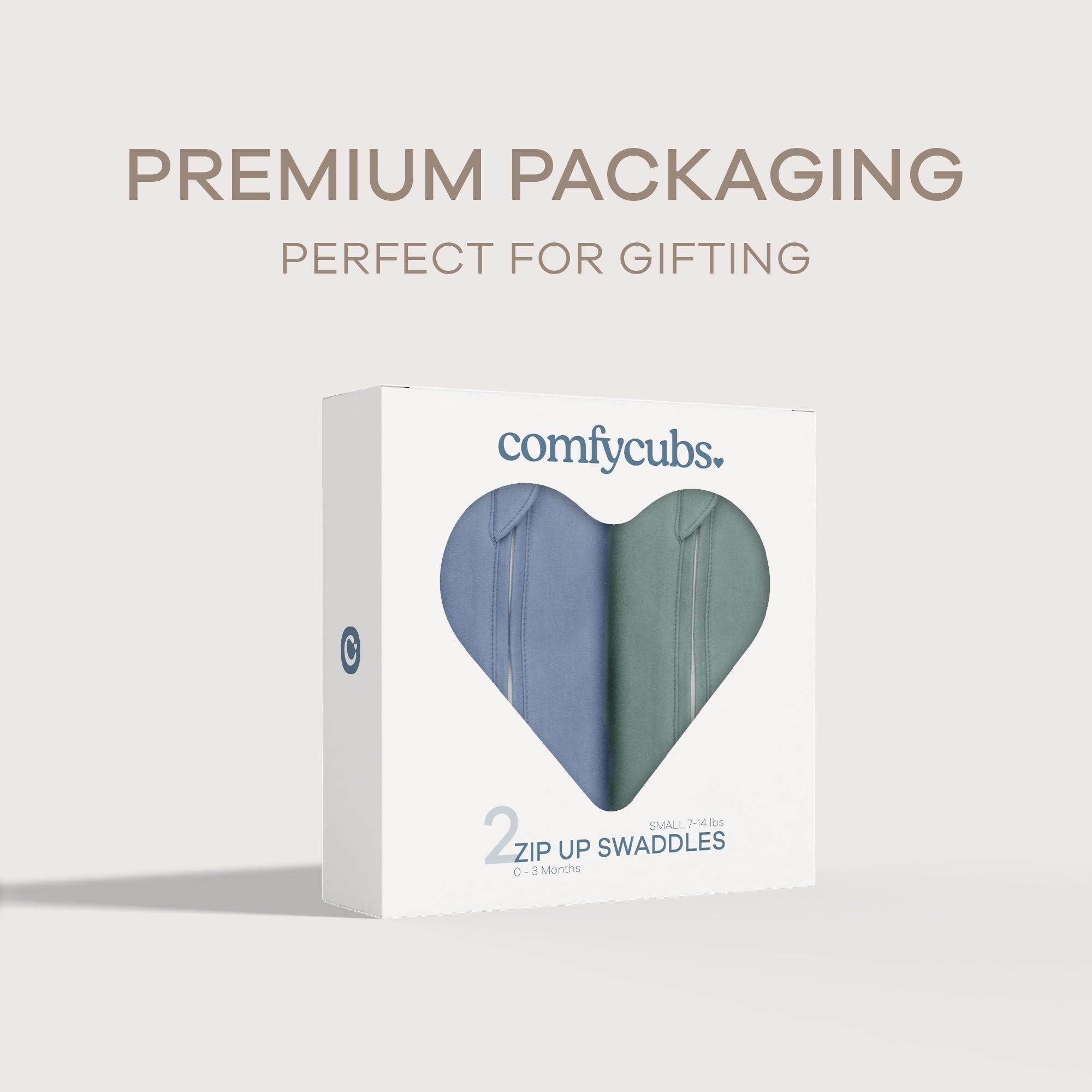 Comfy Cubs swaddle Nomadic Blue size label indicates newborn fit 0-3 months.