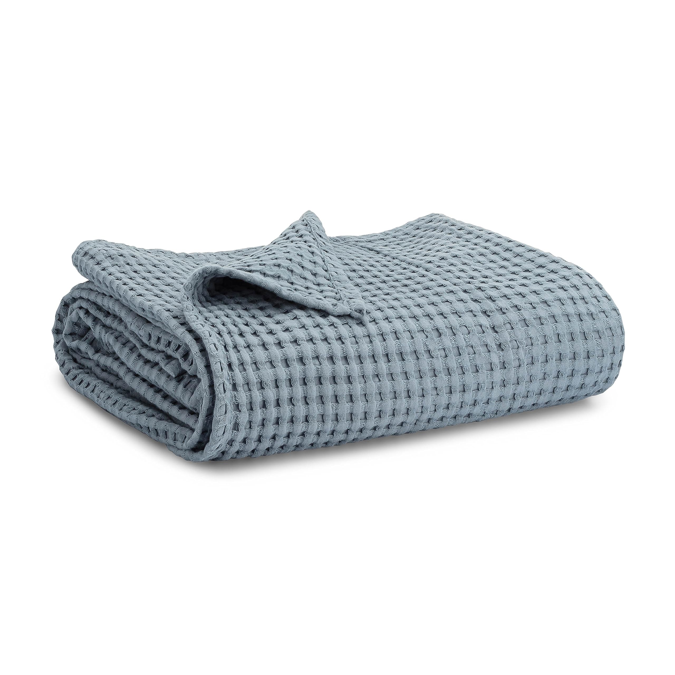 Comfy Cubs waffle blanket texture closeup highlights breathable cotton warmth for year-round comfort.