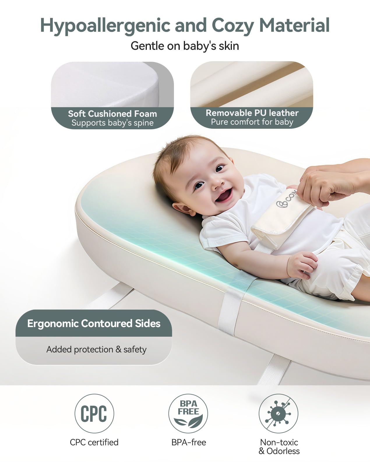 COMOMY contoured-walls help keep baby safely centered during changes.