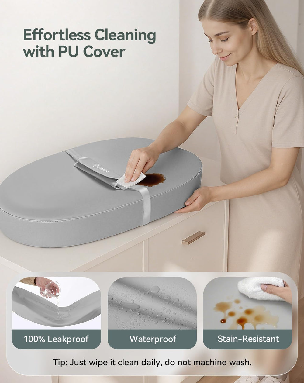 COMOMY changing pad shows soft vegan leather outer for gentle contact