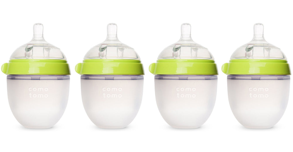 Comotomo four-pack 5 oz green bottles show easy-clean wide neck design for busy parents