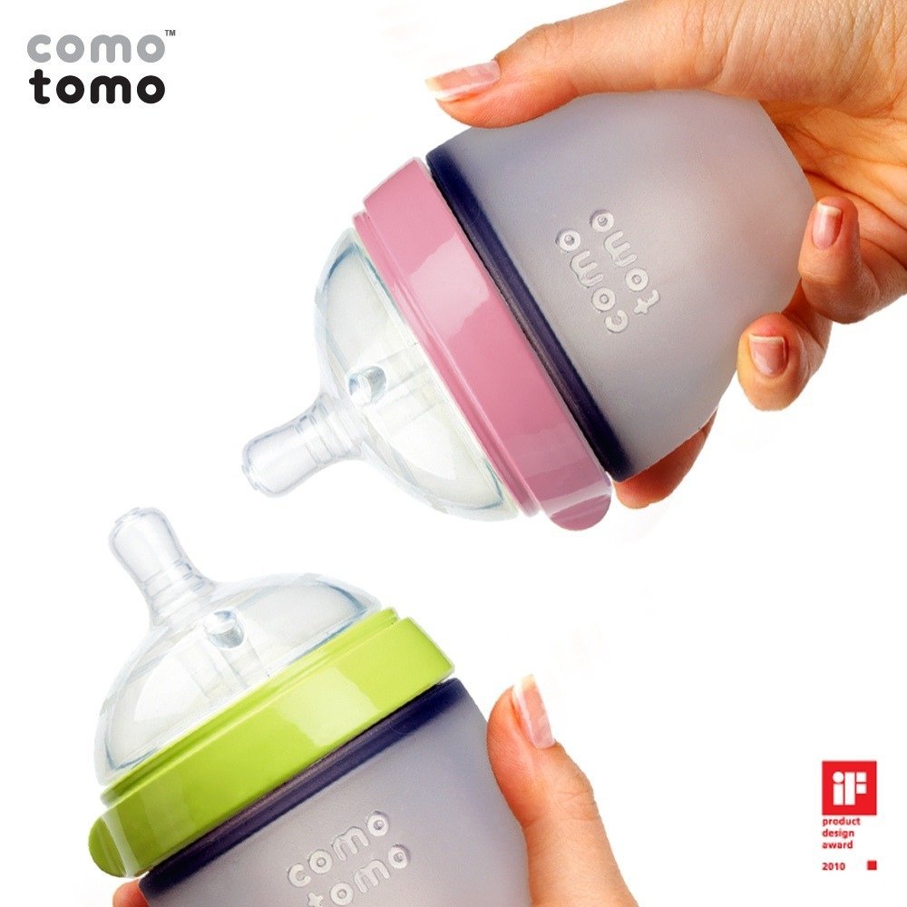 Comotomo silicone nipple close-up in green bottle highlighting skin-like softness for soothing feeds