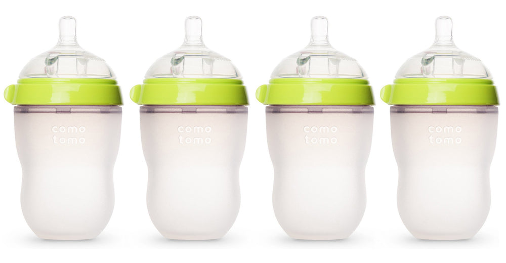 Comotomo natural feel baby bottle 4-pack in green, comfortable grip for easy feeding transitions.