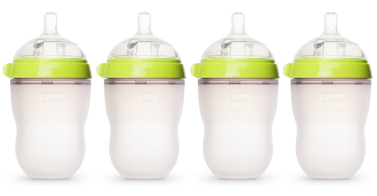 Comotomo natural feel baby bottle 4-pack in green, comfortable grip for easy feeding transitions.