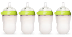 Comotomo natural feel baby bottle 4-pack in green, comfortable grip for easy feeding transitions.
