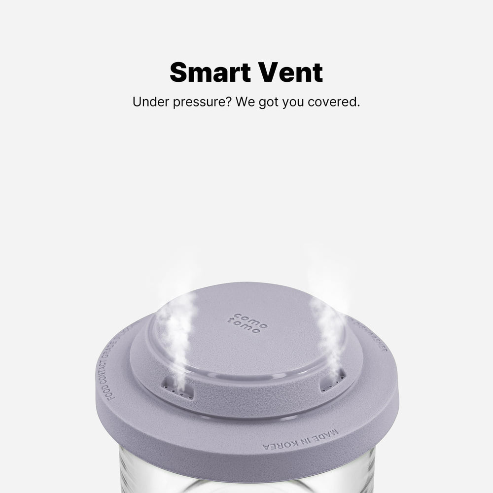 Comotomo Smart Vent lid releasing steam during heating for safer use