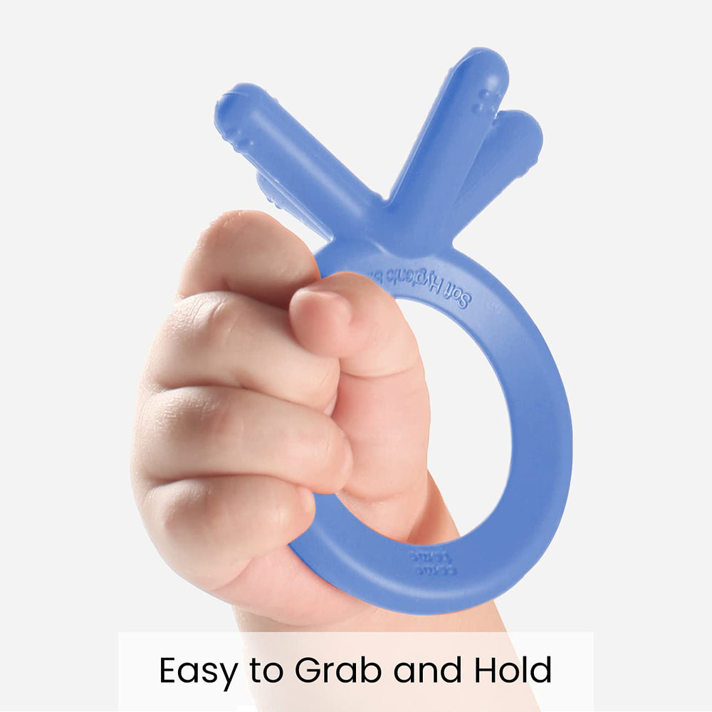 Comotomo teether blue grip close-up shows finger-like design for easy grasp