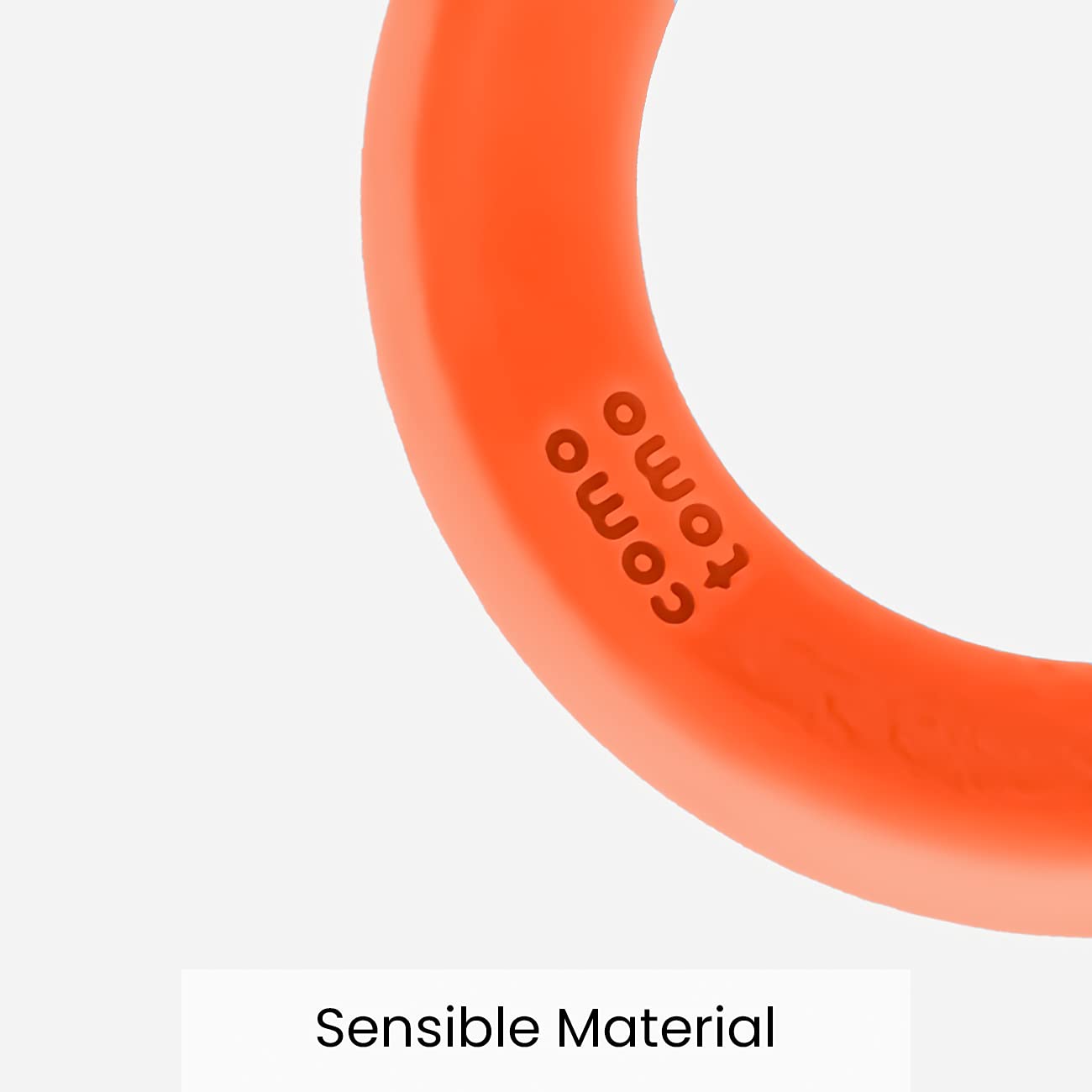 Comotomo teether orange cleaning example emphasizing one-piece design for easier sanitation.