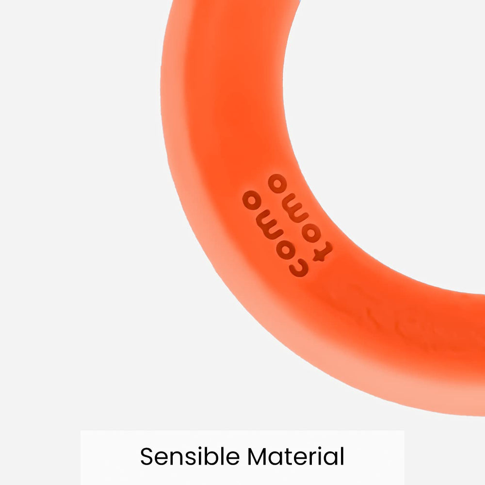 Comotomo teether orange cleaning example emphasizing one-piece design for easier sanitation.