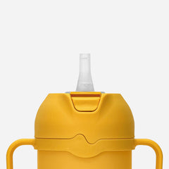 Comotomo Toddler Tumbler 8oz yellow close-up of spout and straw for versatile sipping