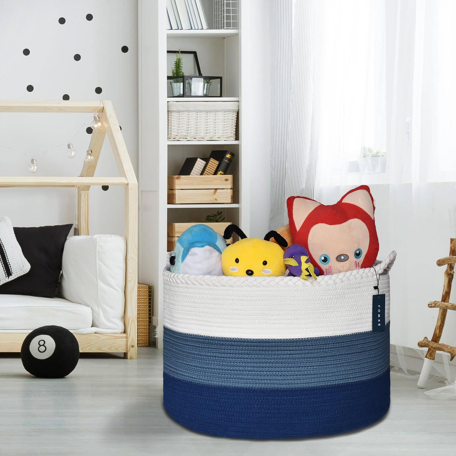 COMSE blanket basket in nursery setup keeps blankets neatly accessible.