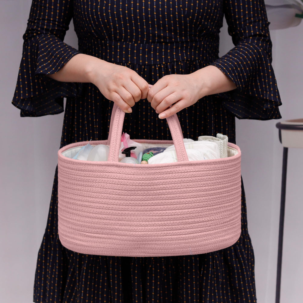 COMSE diaper caddy handles in use, easy to carry between rooms.