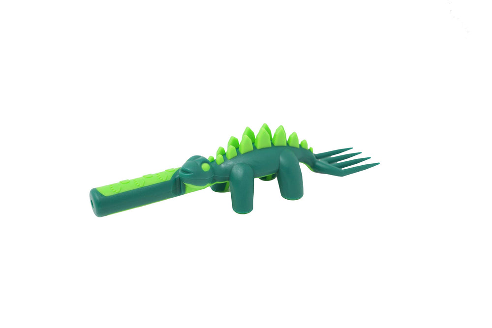 Constructive Eating dinosaur-themed utensils in a colorful meal setup