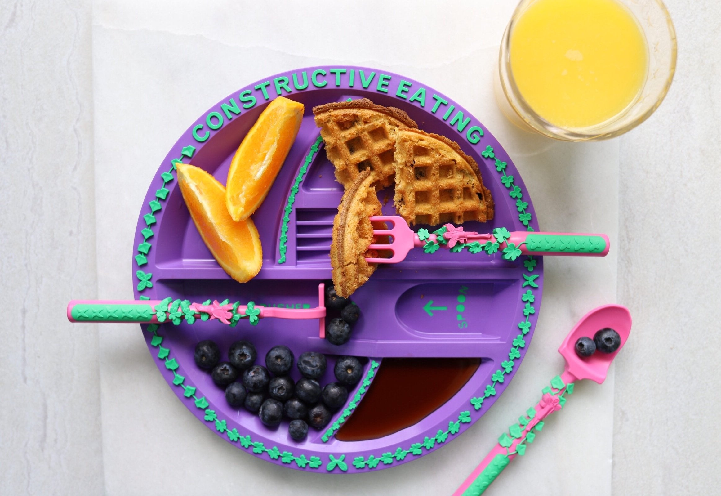 Kid-friendly dining setup by Constructive Eating promotes exploration and motor skills