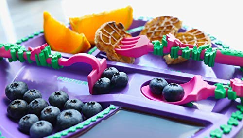 Constructive Eating kid self feeding scene shows enjoyable, safe mealtime.