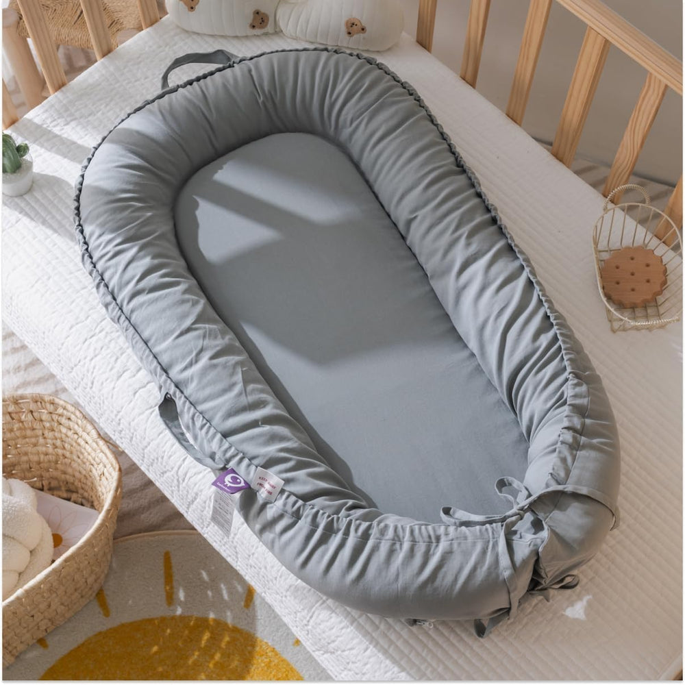 CooCooBaby breathable cotton cover illustrating soft texture for gentle contact