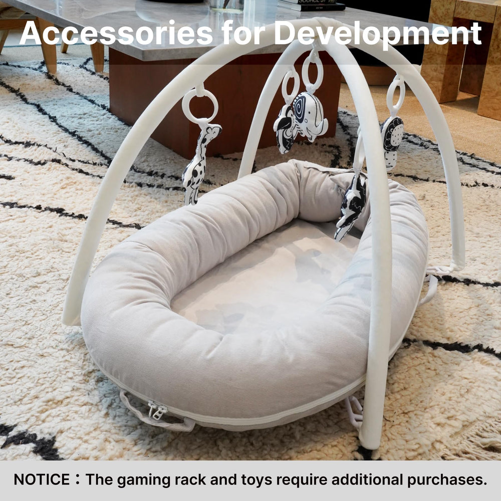 CooCooBaby lounger in Gainsboro shade complements nursery decor.