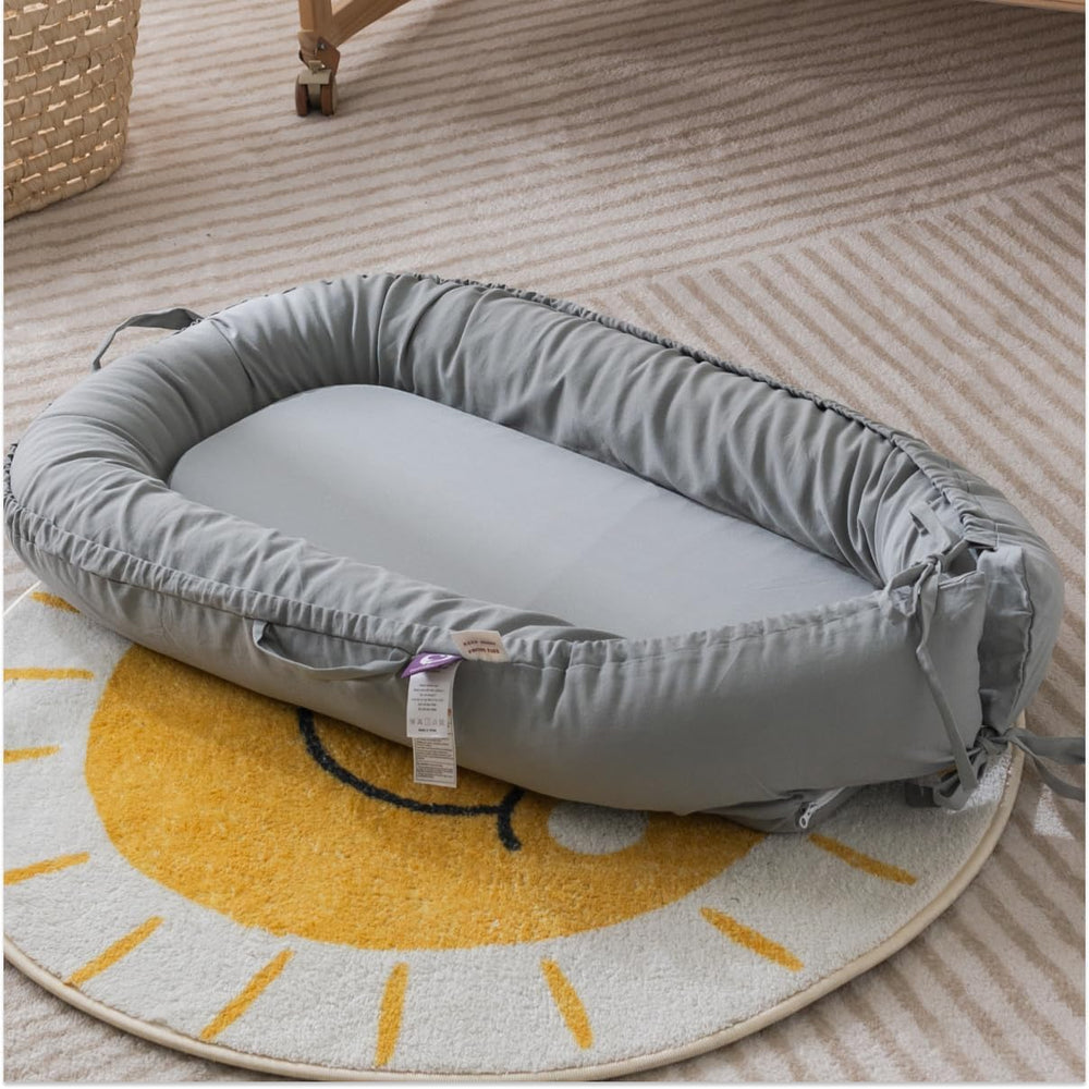 CooCooBaby versatile lounger supports tummy time, sitting, and gentle play