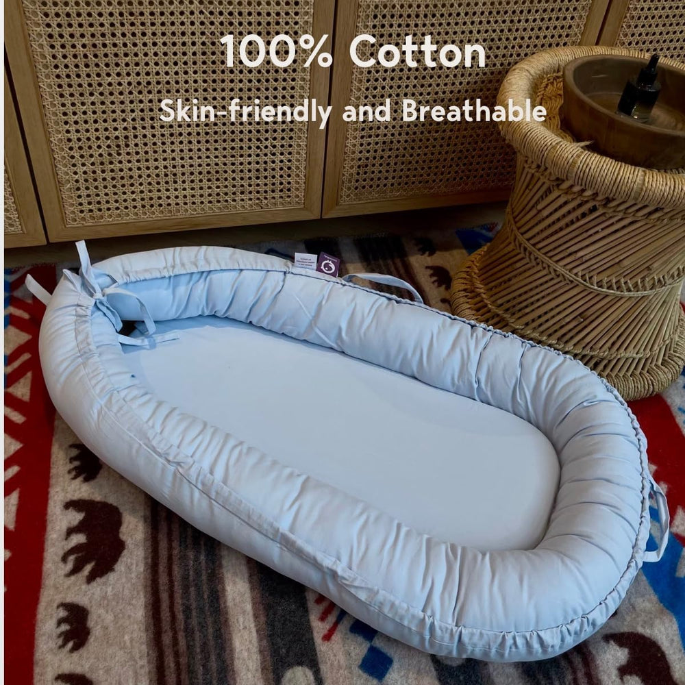 CooCooBaby infant lounger baby in action demonstrates supervised play and cozy containment.