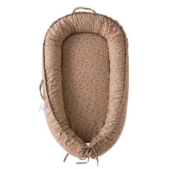 CooCooBaby infant lounger brown blossom cover in use offers cozy support during supervised play.