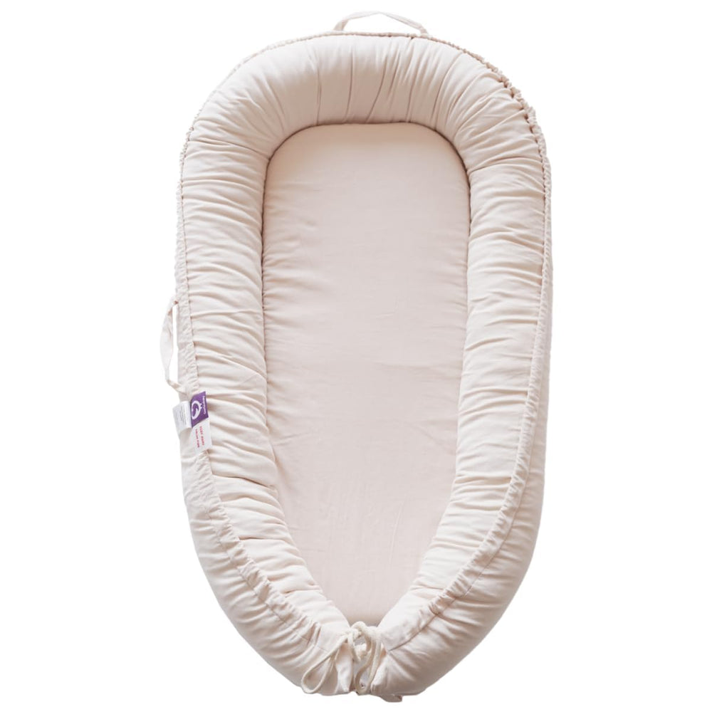 CooCooBaby Infant Lounger cream corduroy cover shows soft, breathable fabric for cozy cuddles and safe lounging.