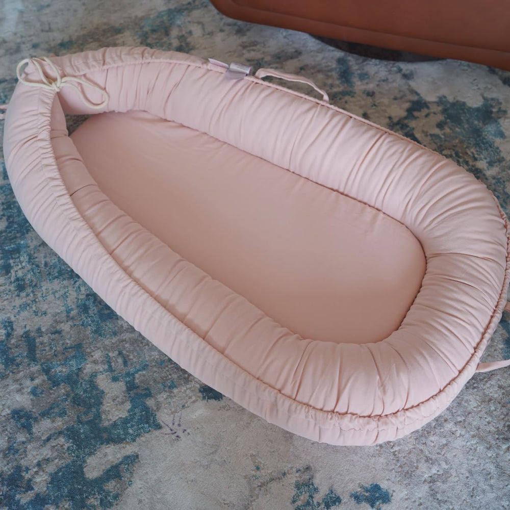 CooCooBaby infant lounger on floor demonstrates supervised playtime and calm lounging