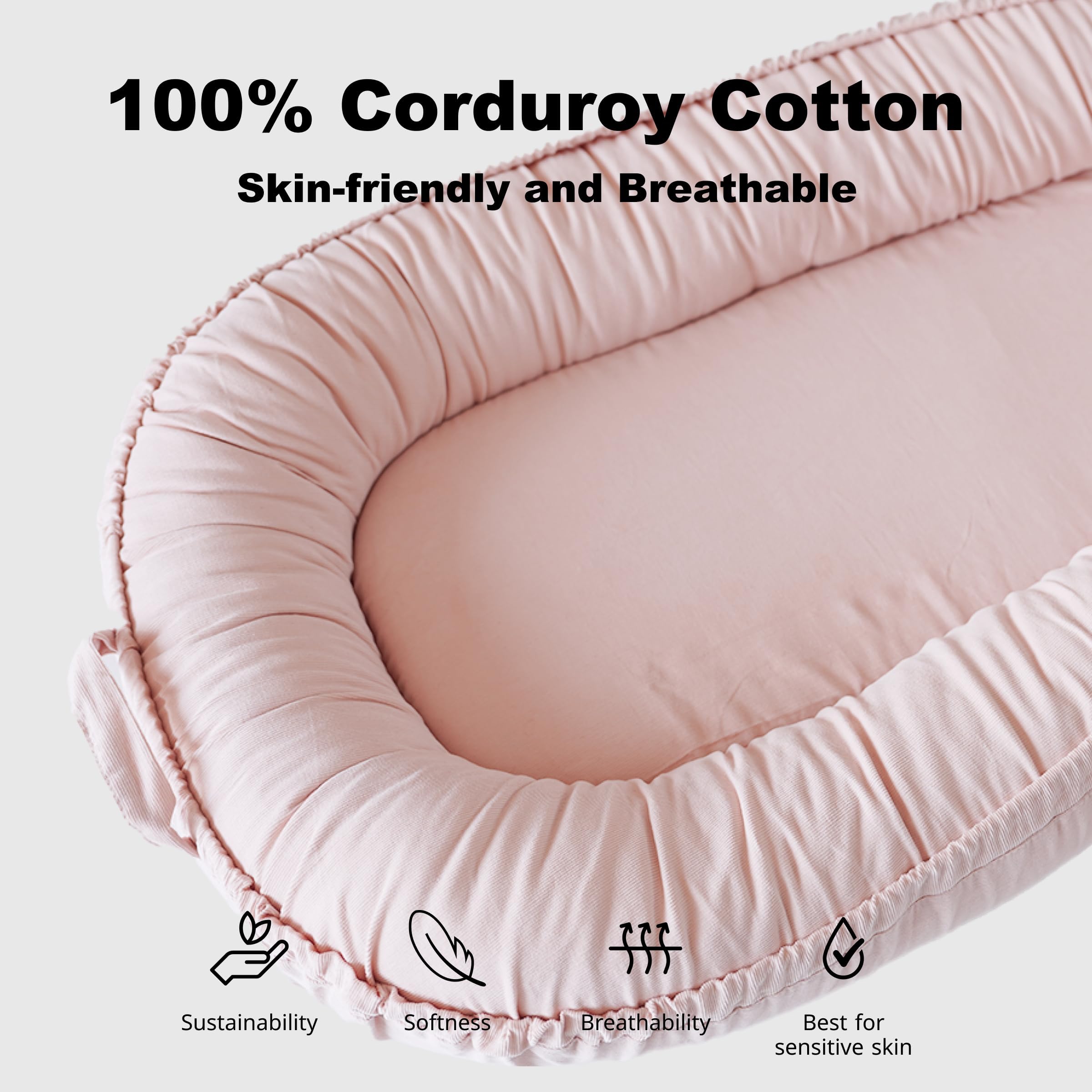CooCooBaby infant lounger Mistyrose Corduroy in crib setup for gentle resting