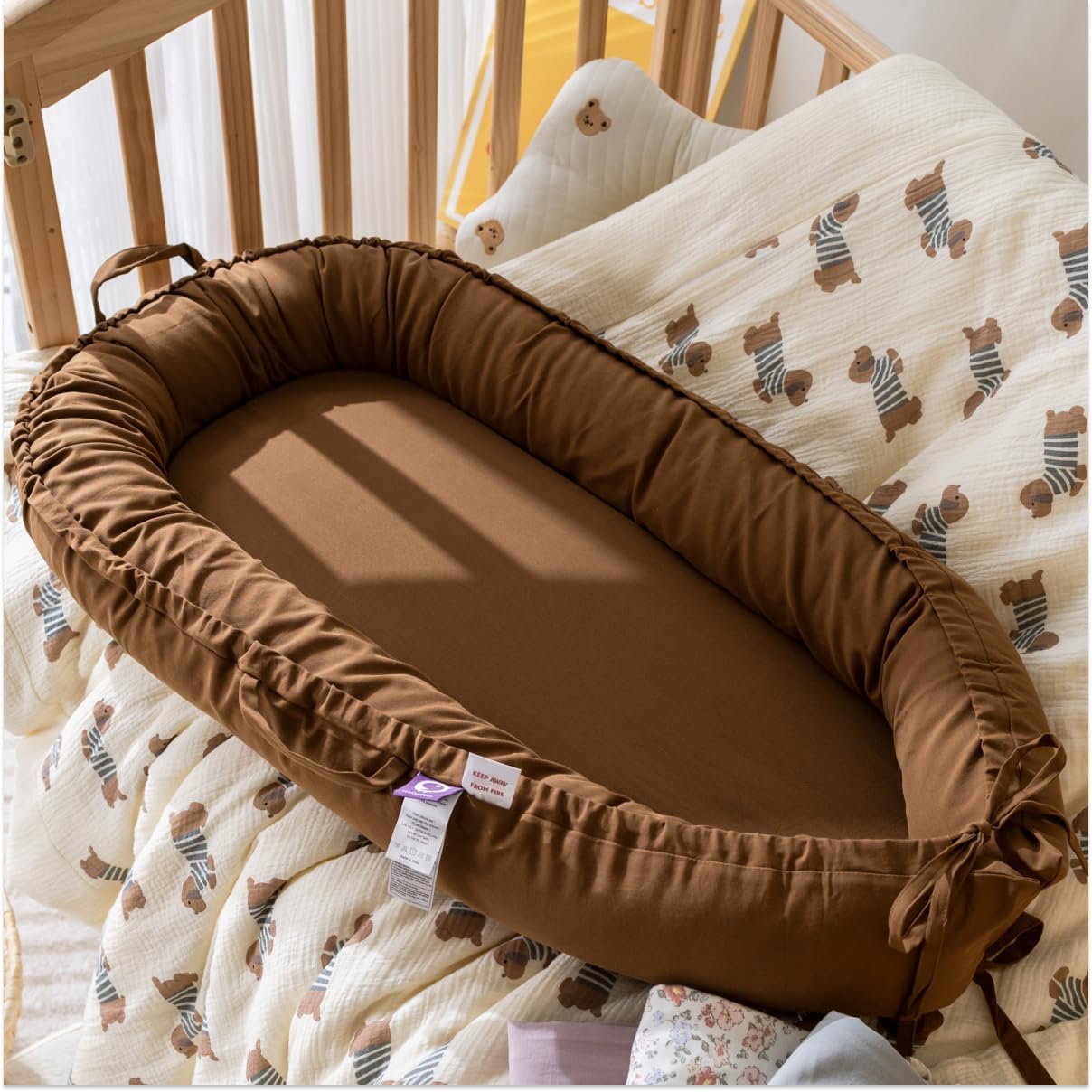 CooCooBaby infant lounger tummy-time use highlights safe, engaging activity with secure positioning.