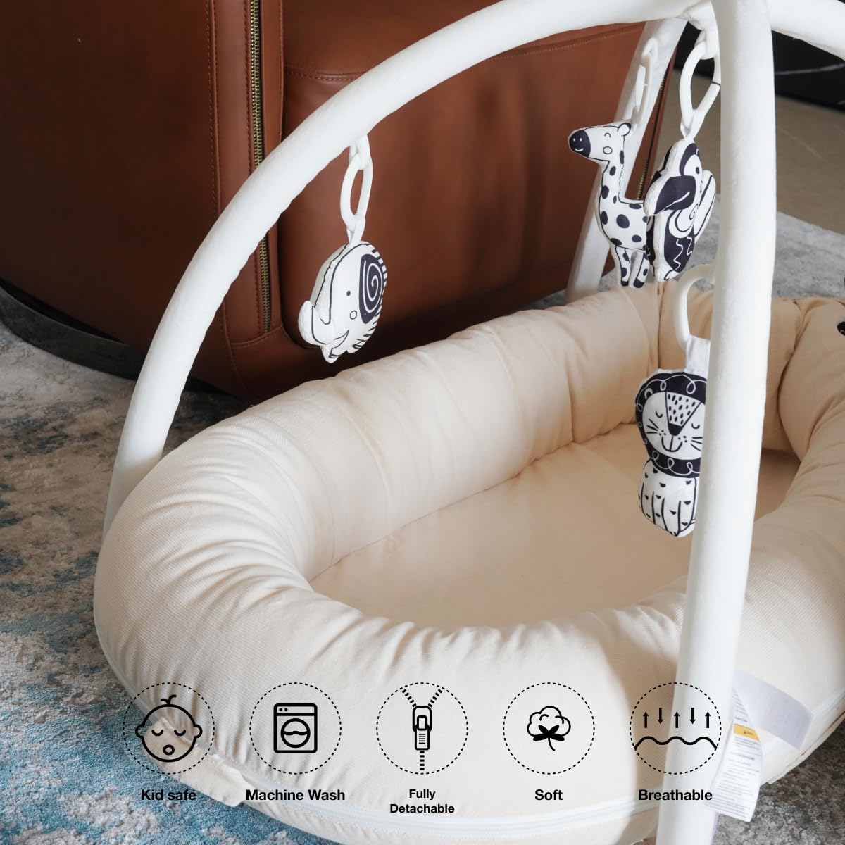 CooCooBaby lounger converts to a portable play mat for versatile use.